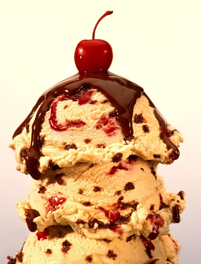 Chocolate chip ice cream with raspberry, hot fudge and a cherry