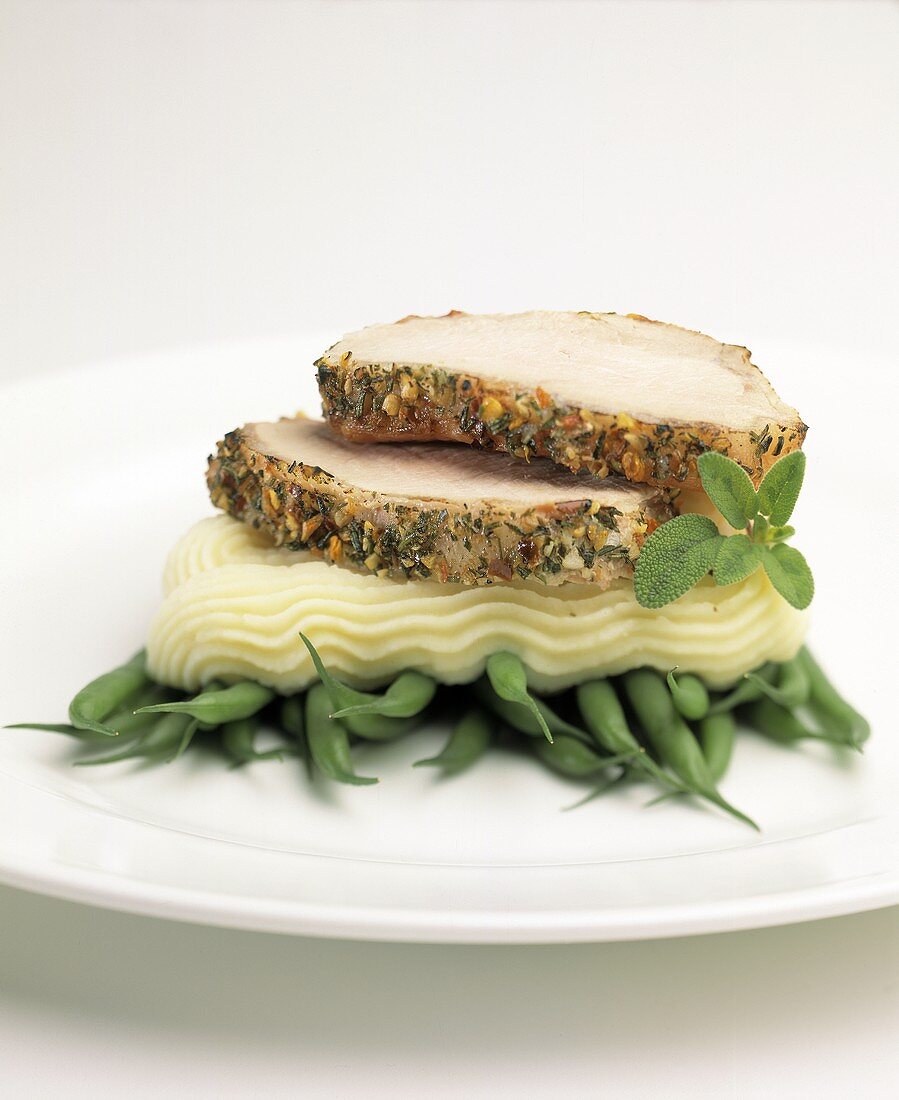Sliced Pork Loin on Mashed Potatoes and Green Beans