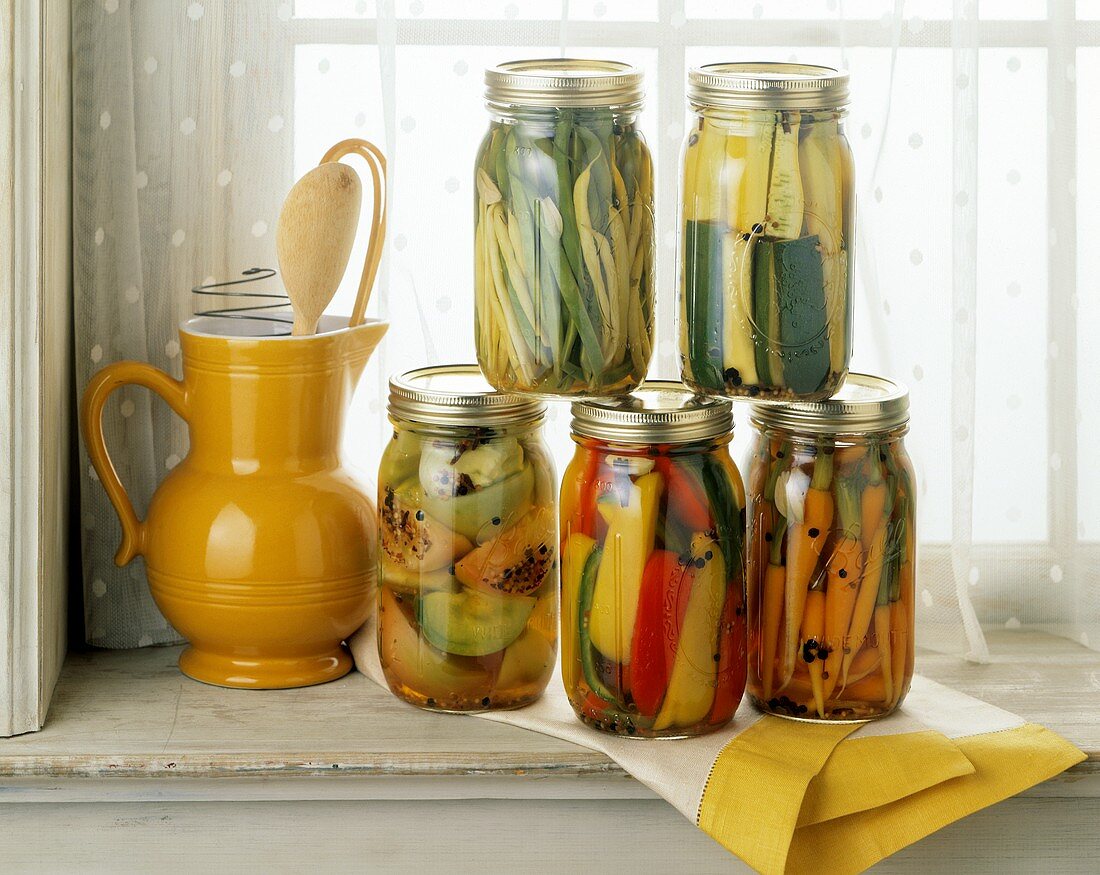 Pickled Vegetables in Jars on Windowsill