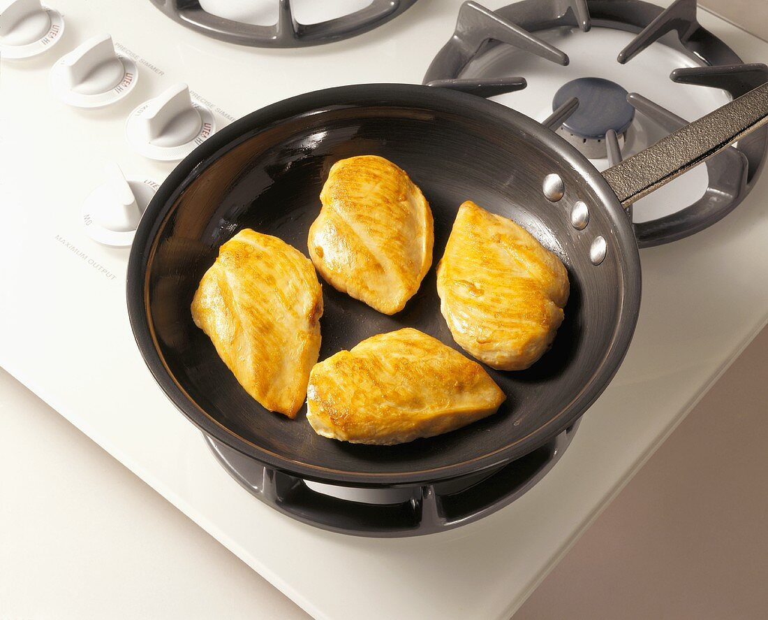 Chicken Breast in Skillet on Stovetop