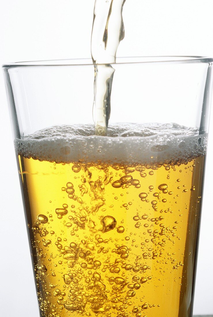 Beer Being Poured into Glass; Bubbles and Clarity