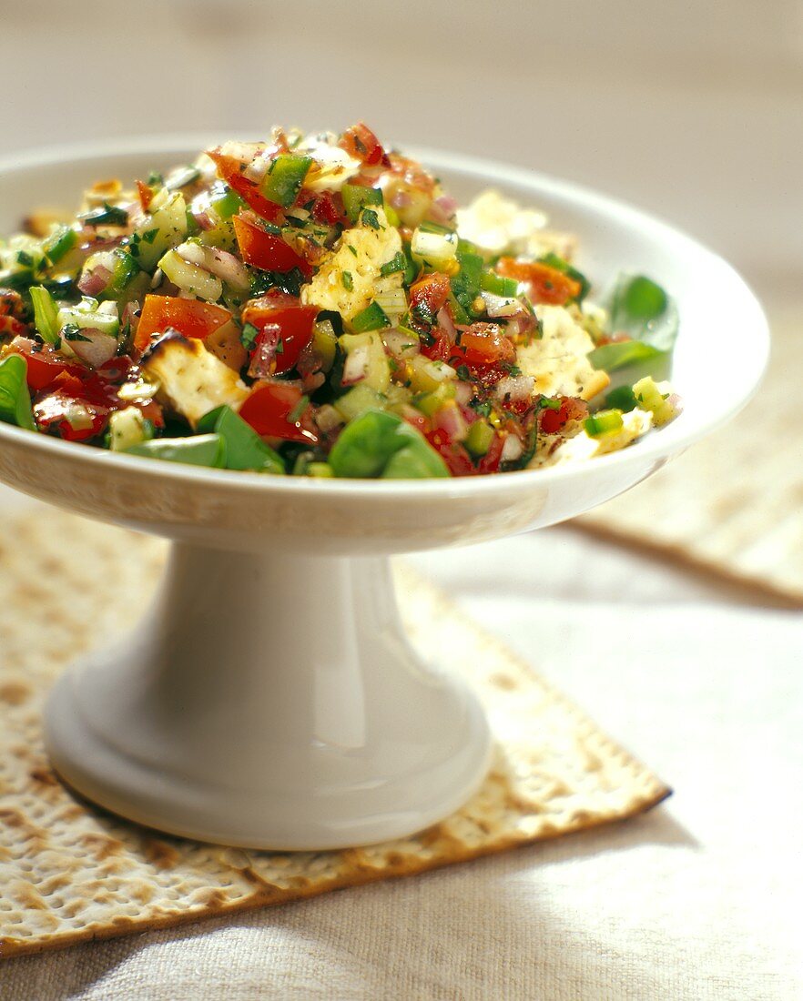 Salad of Baby Spinach, Tomatoes, Onions, Peppers and Matzoh Crackers