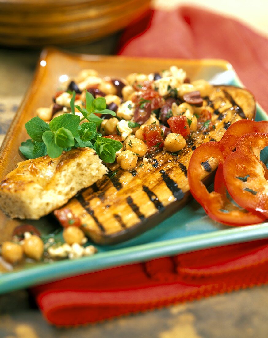 Barbecued aubergine with chick-pea salad and flatbread