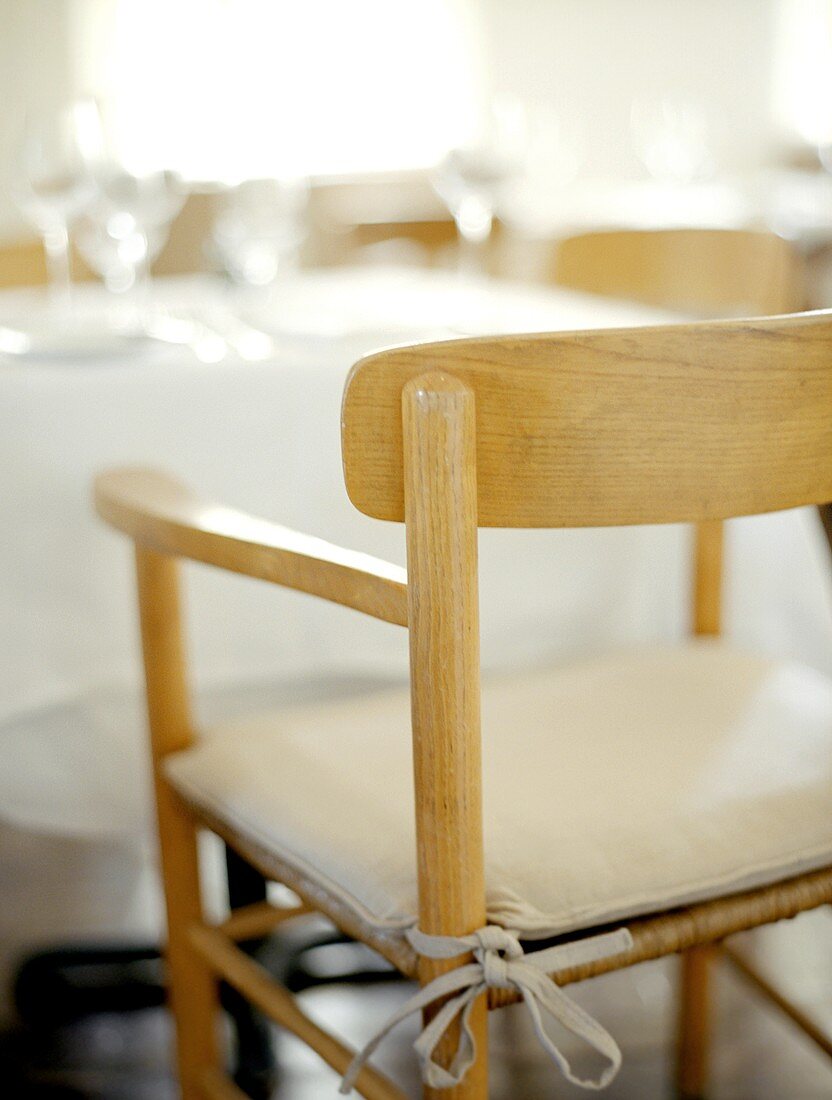 A Chair at a Set Table