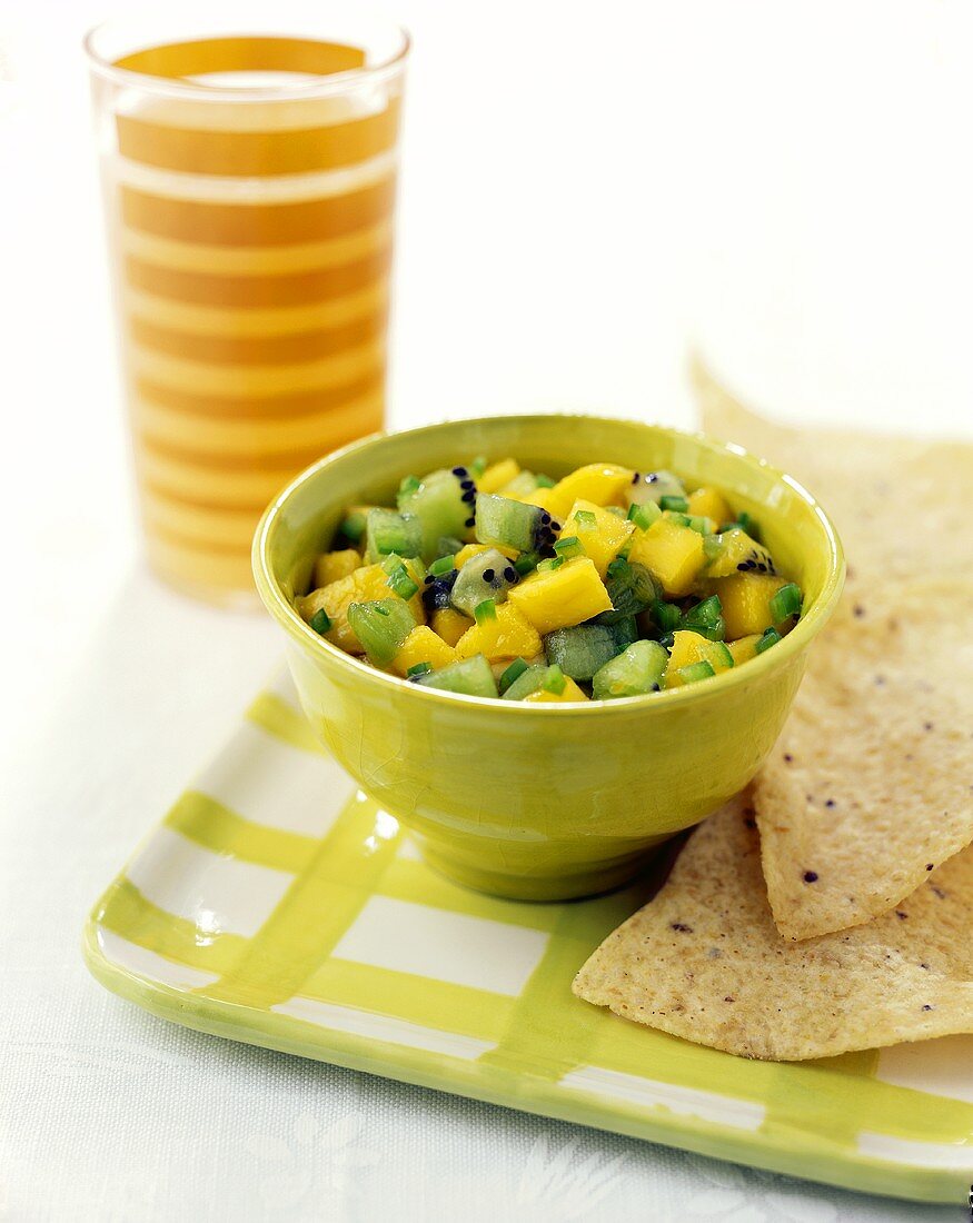 Mango and kiwi fruit salsa with tortilla chips