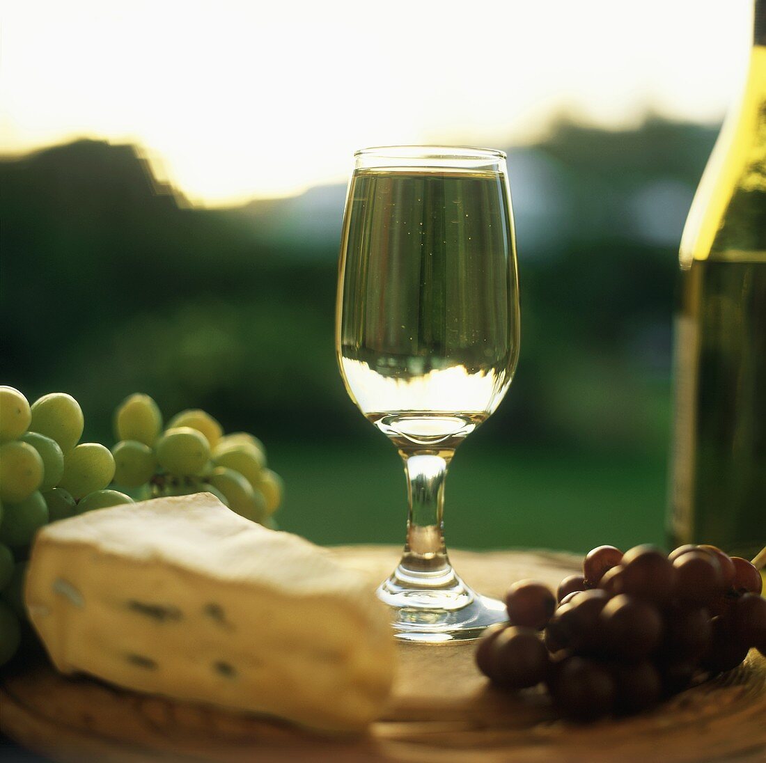 A Glass of Chardonnay with Cambozola Cheese and Grapes