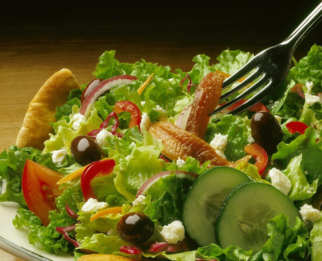 A Greek Salad with Anchovies; Close Up