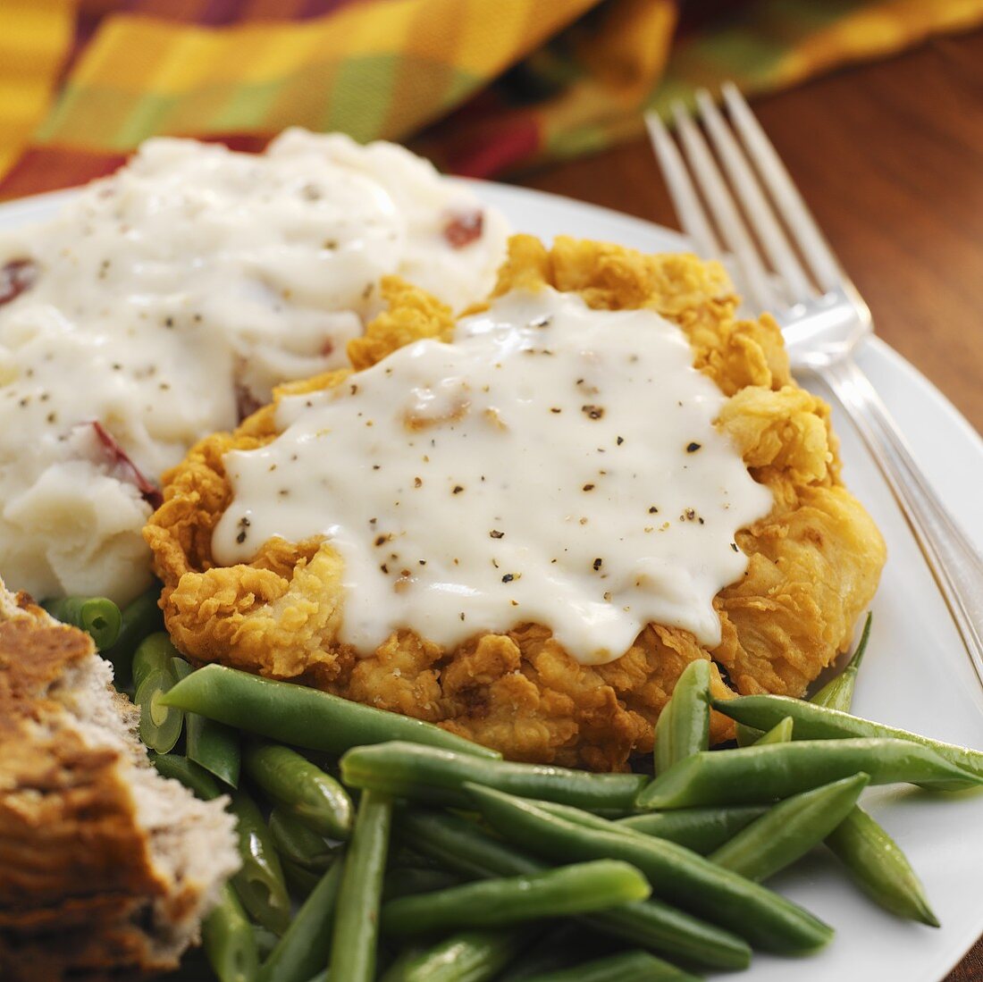 Hähnchenschnitzel mit Kartoffelpüree und grünen Bohnen