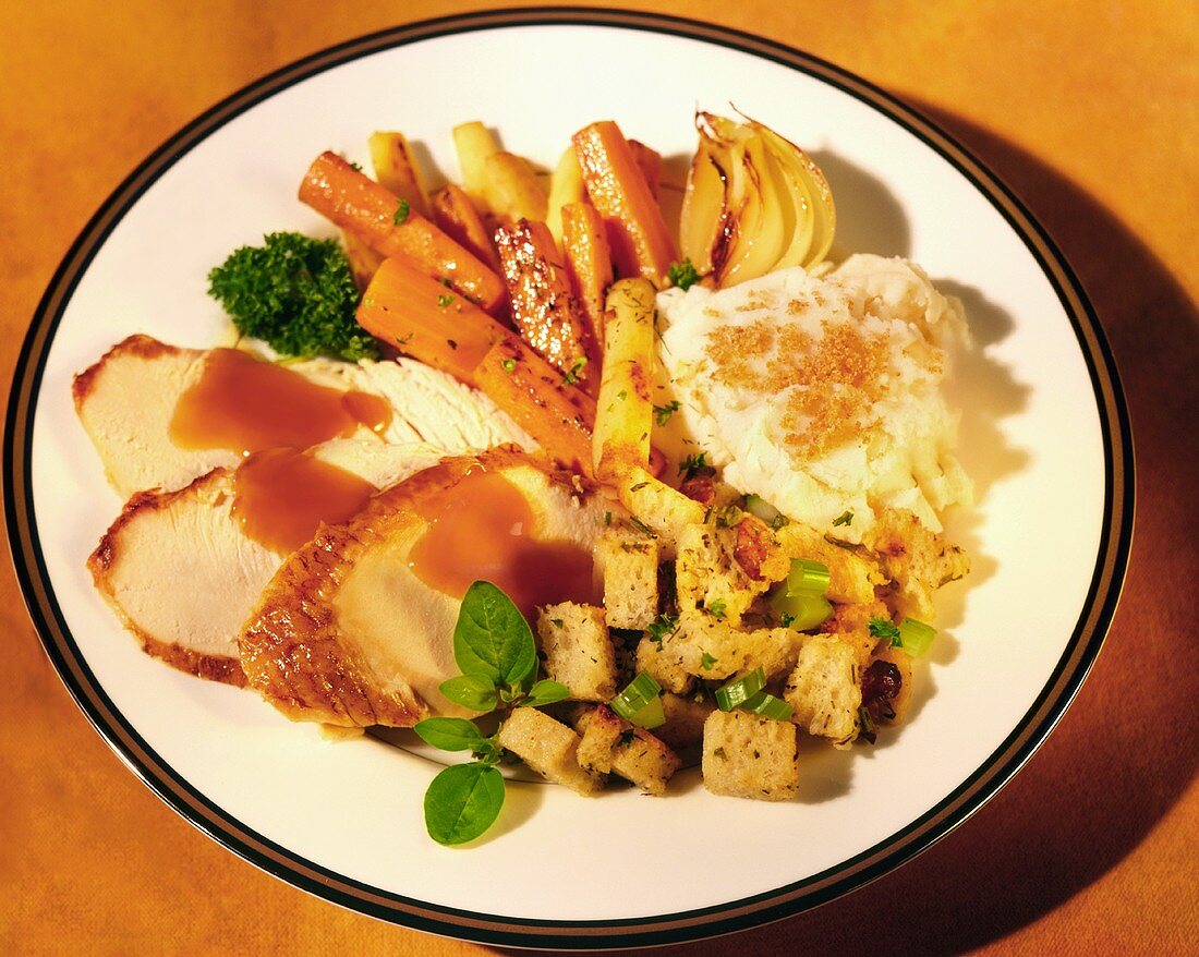 Sliced Roast Turkey with Potato, Stuffing and Vegetables