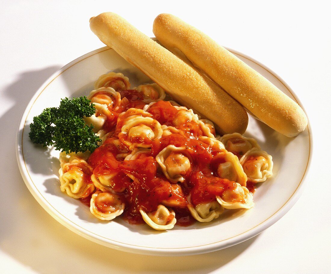 Tortellini with Tomato Sauce and Bread Sticks