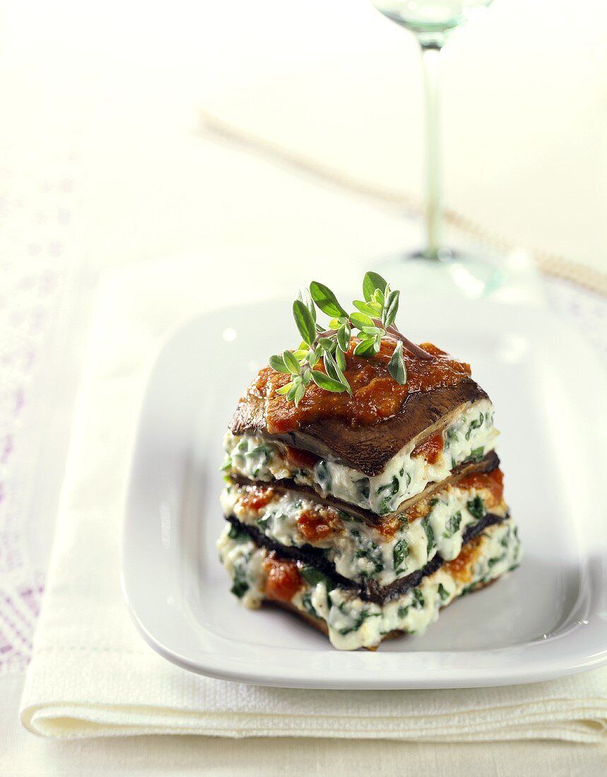 Small mushroom lasagne with soft cheese with herbs