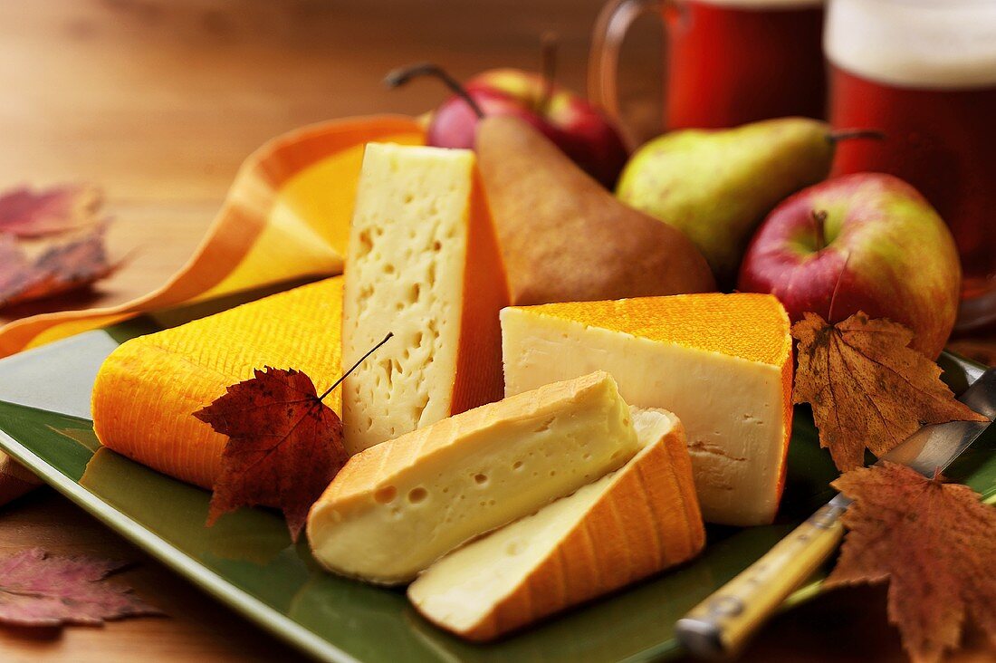 Autumnal cheese platter with apples and pears