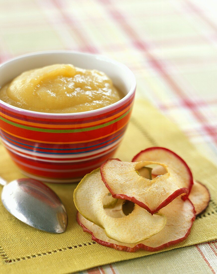 A Bowl of Applesauce with Dried Apple Slices