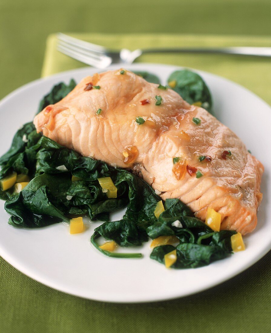 Baked Salmon on a Bed of Sauteed Spinach