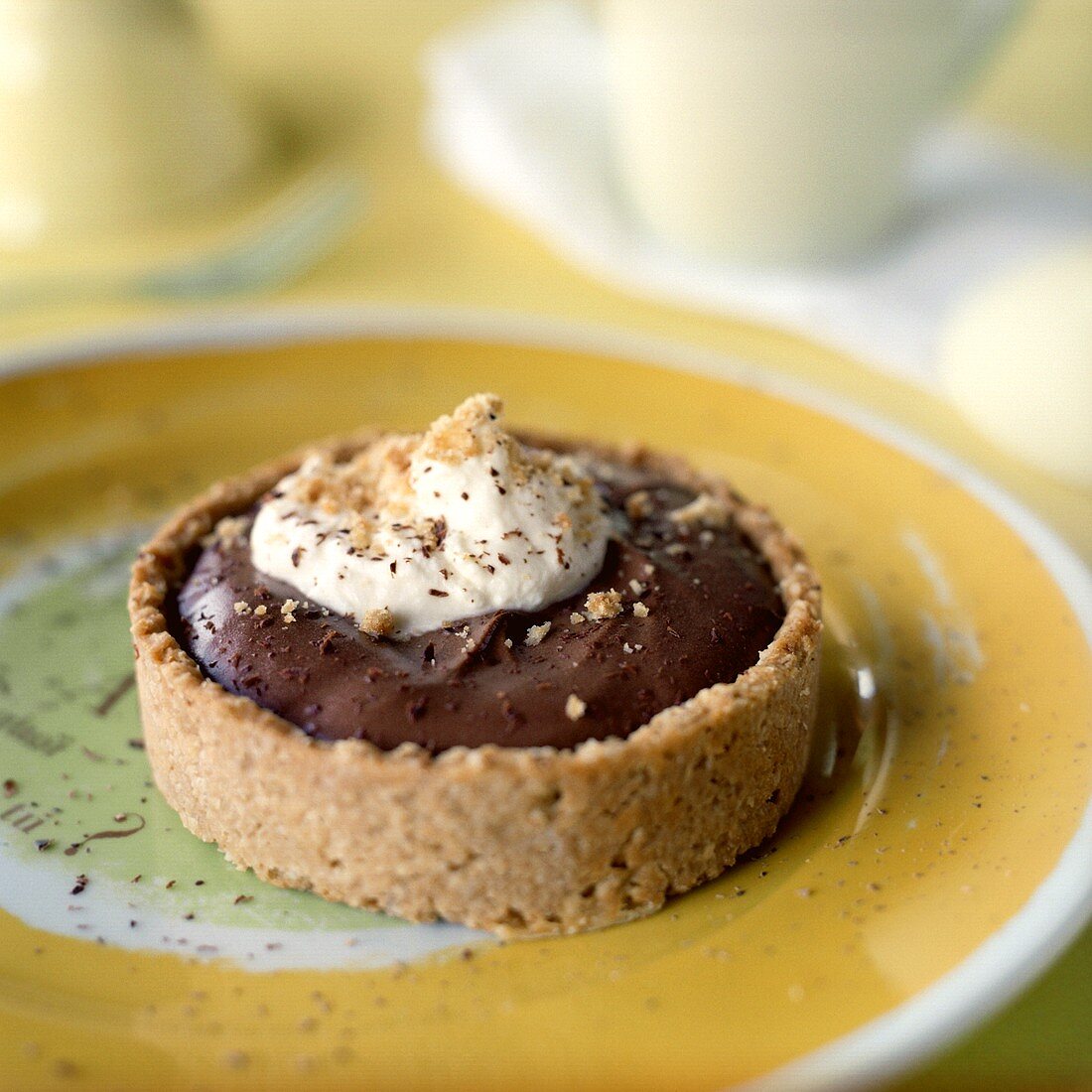Chocolate Cream Pie Tartlet in an Oatmeal Crust with Whipped Cream