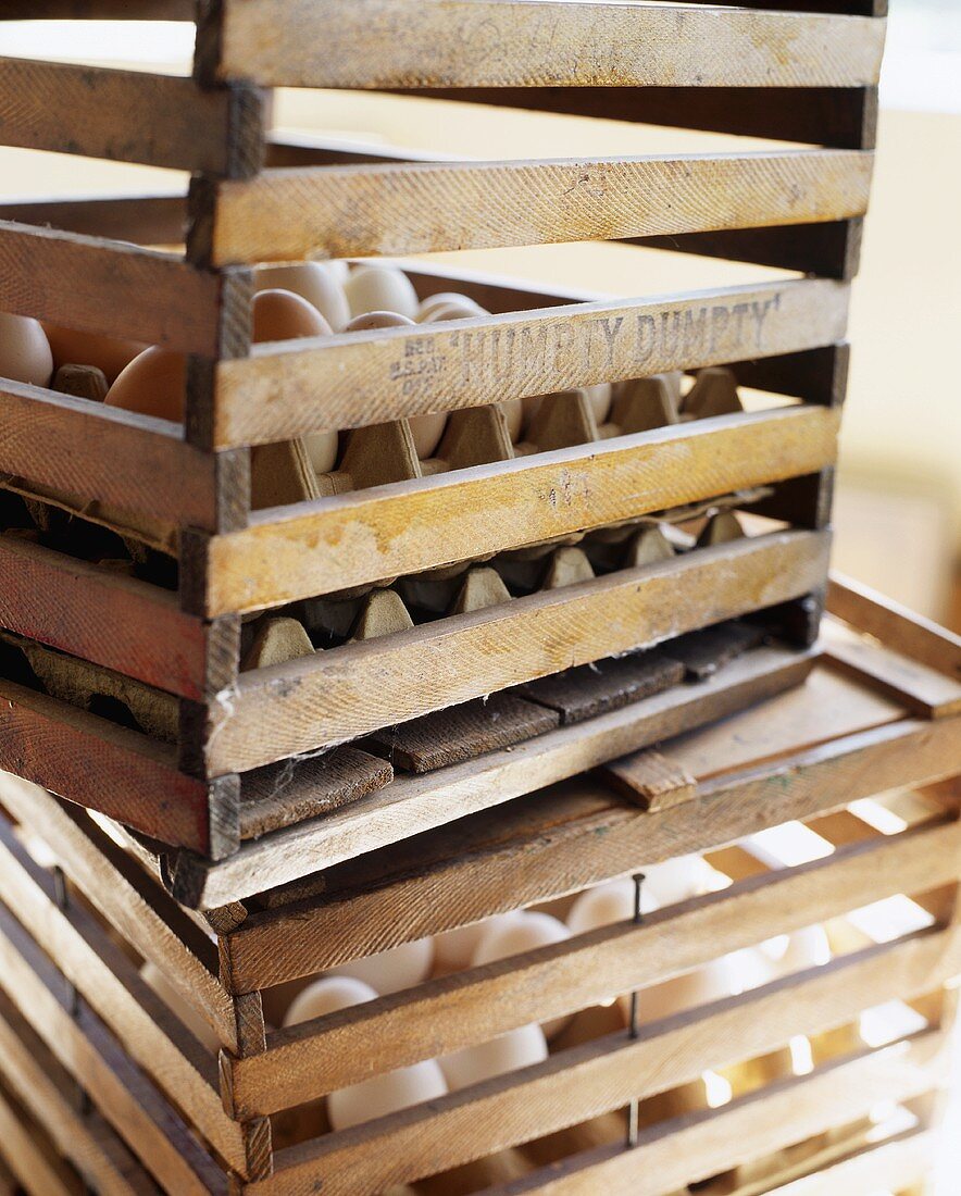 Wooden Egg Crates with White and Brown Eggs