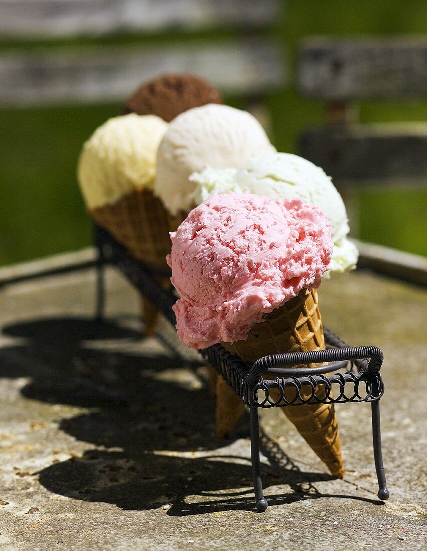 Assorted Ice Cream Cone Flavors in a Holder Outside