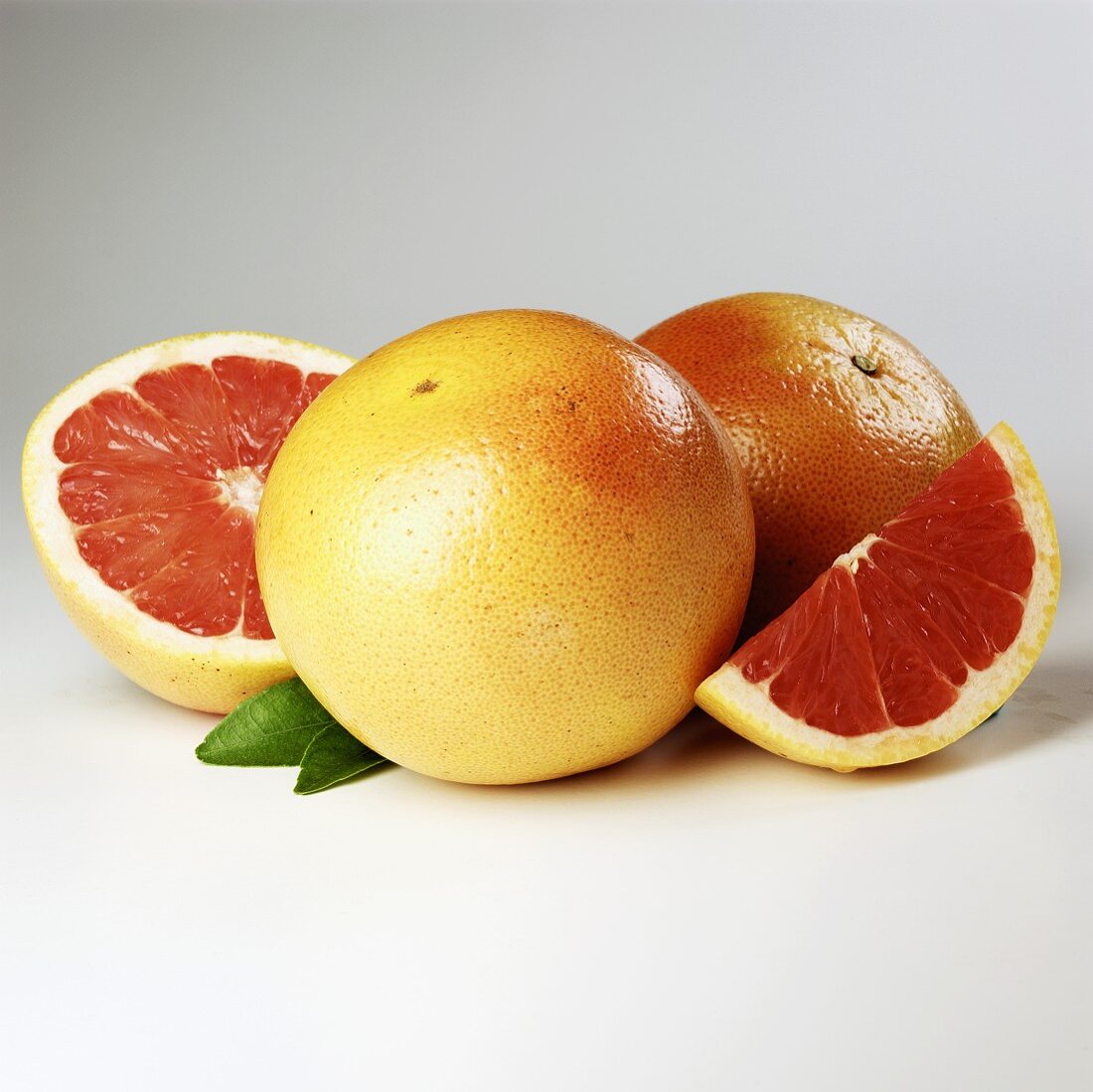 Pink Grapefruits on White Background