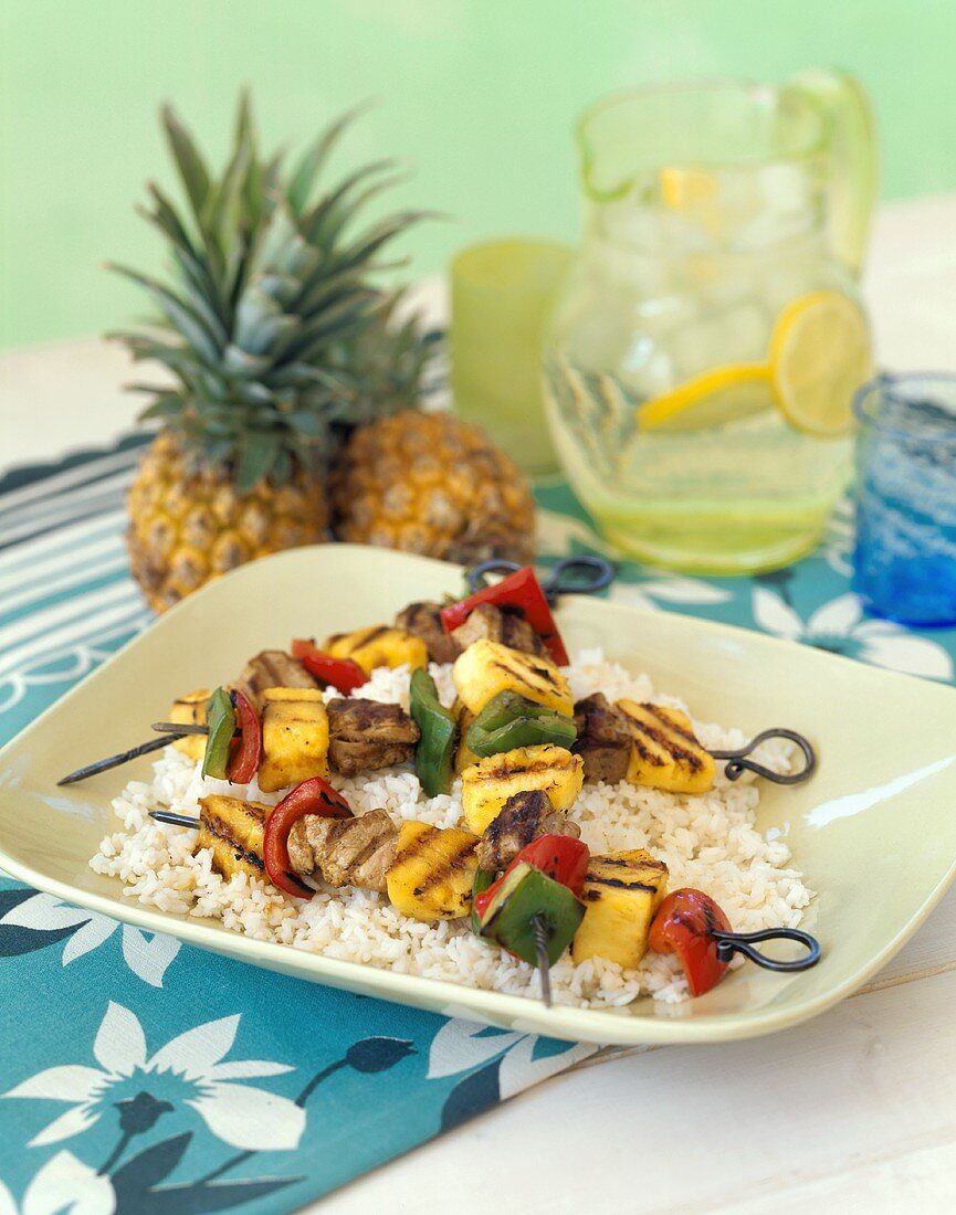 Pork Kebabs on a Bed of White Rice