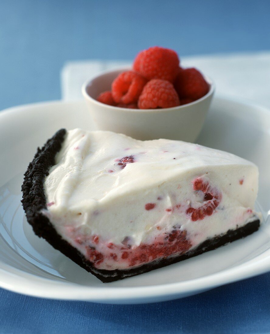 A Slice of Raspberry Cream Pie with Chocolate Cookie Crust