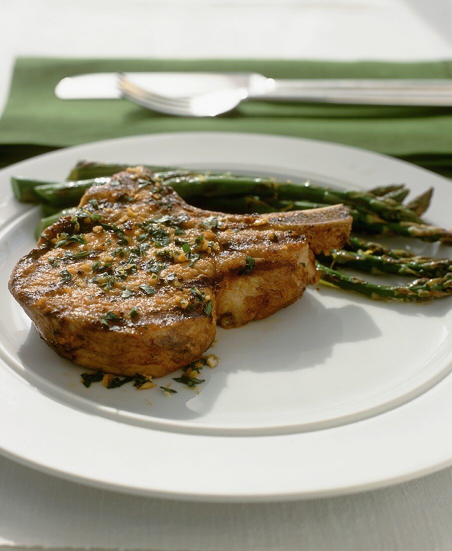 Marinated and Grilled Pork Chop with Asparagus