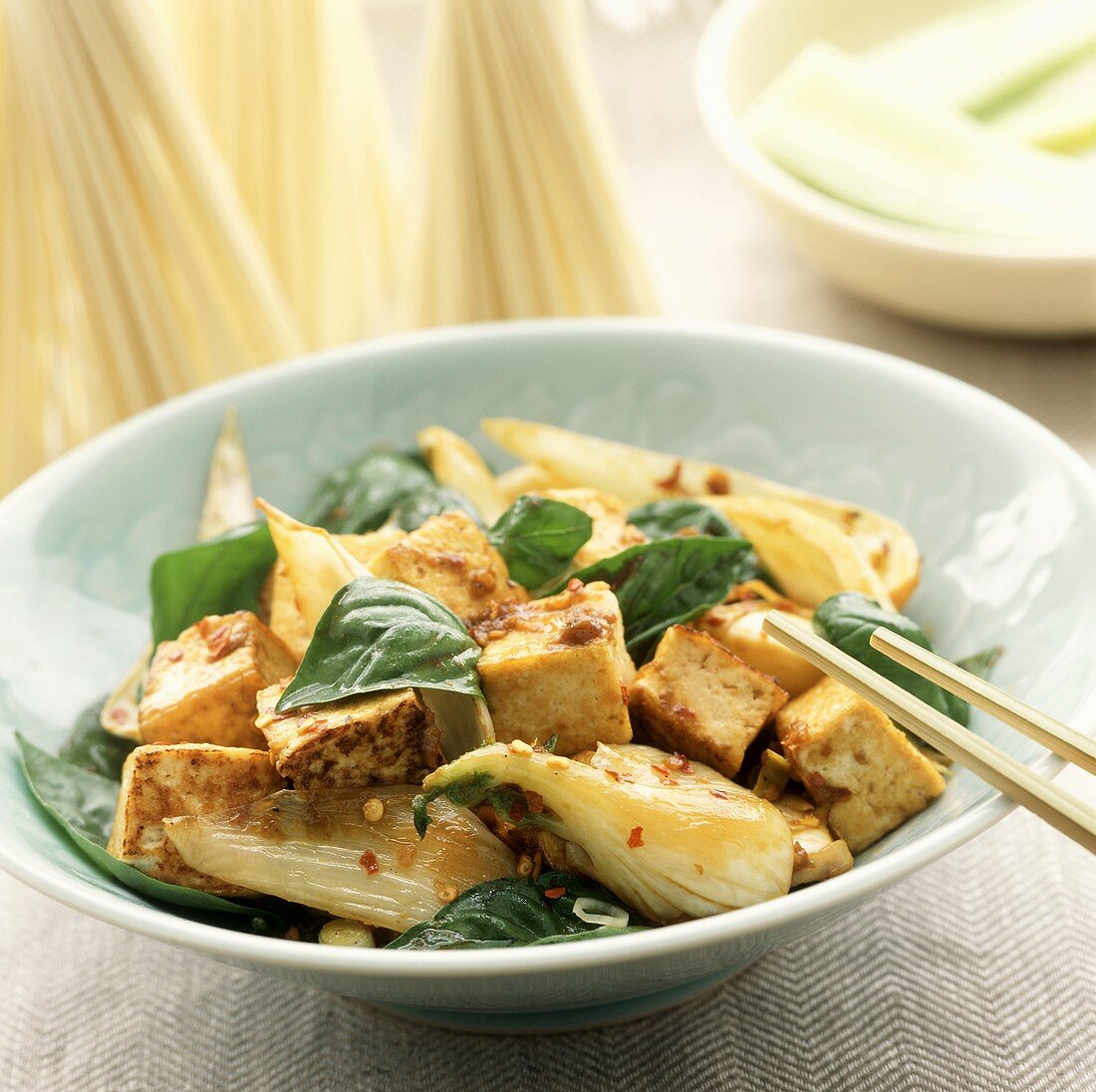 Stir Fried Tofu with Basil Leaves and Bok Choy with Chopsticks