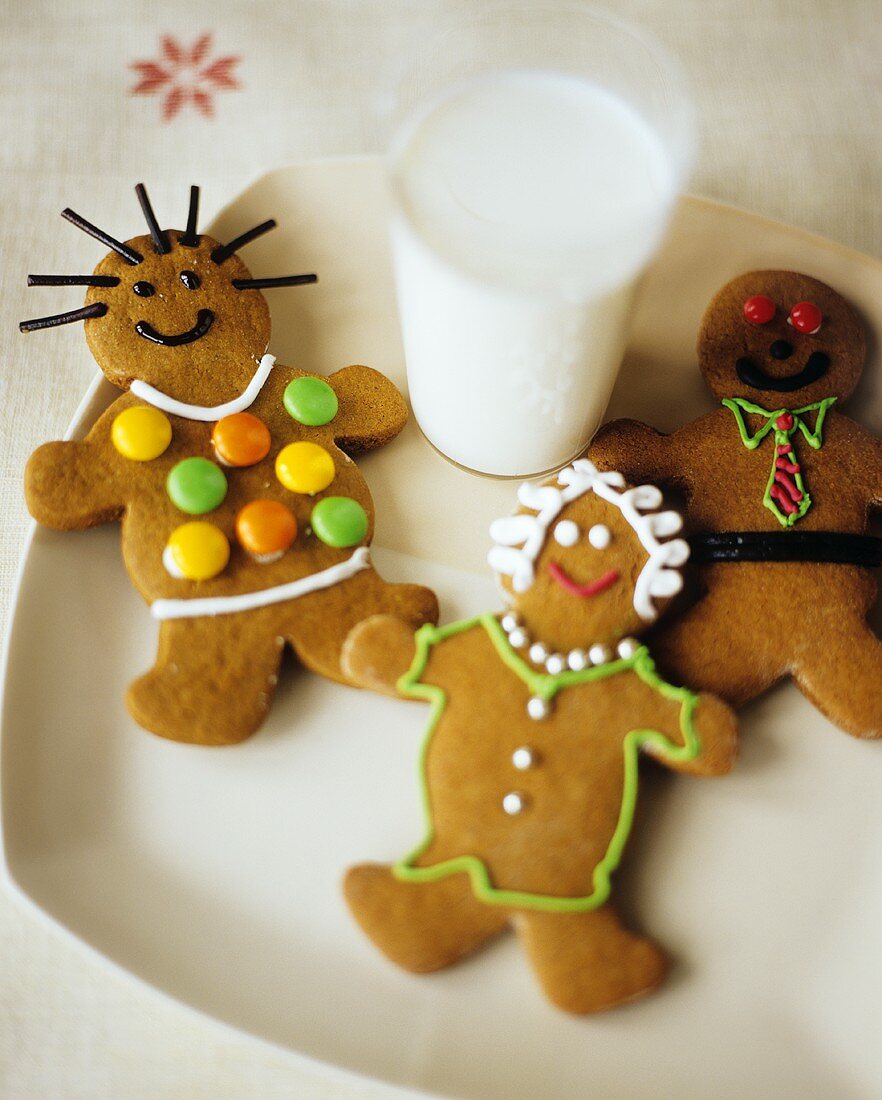 Gingerbread figures and a glass of milk for children