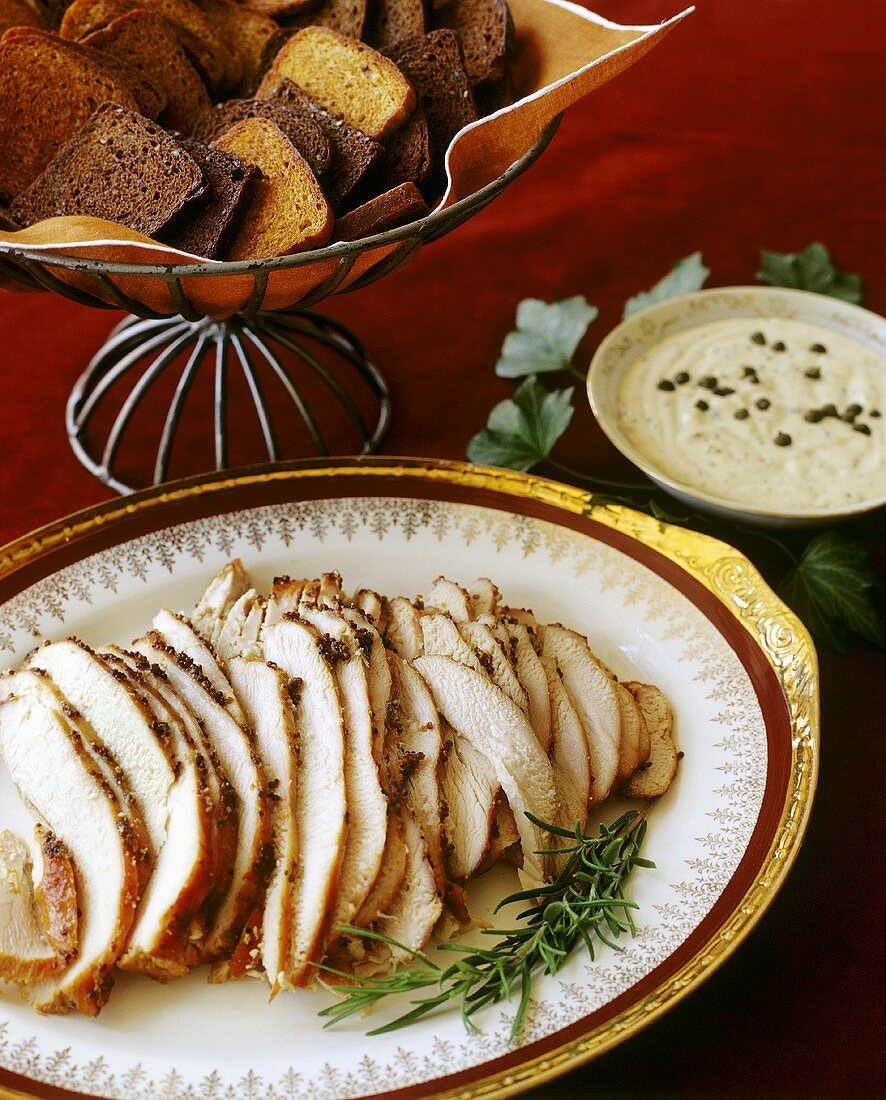 Sliced Turkey on a Platter with Toast and Remoulade