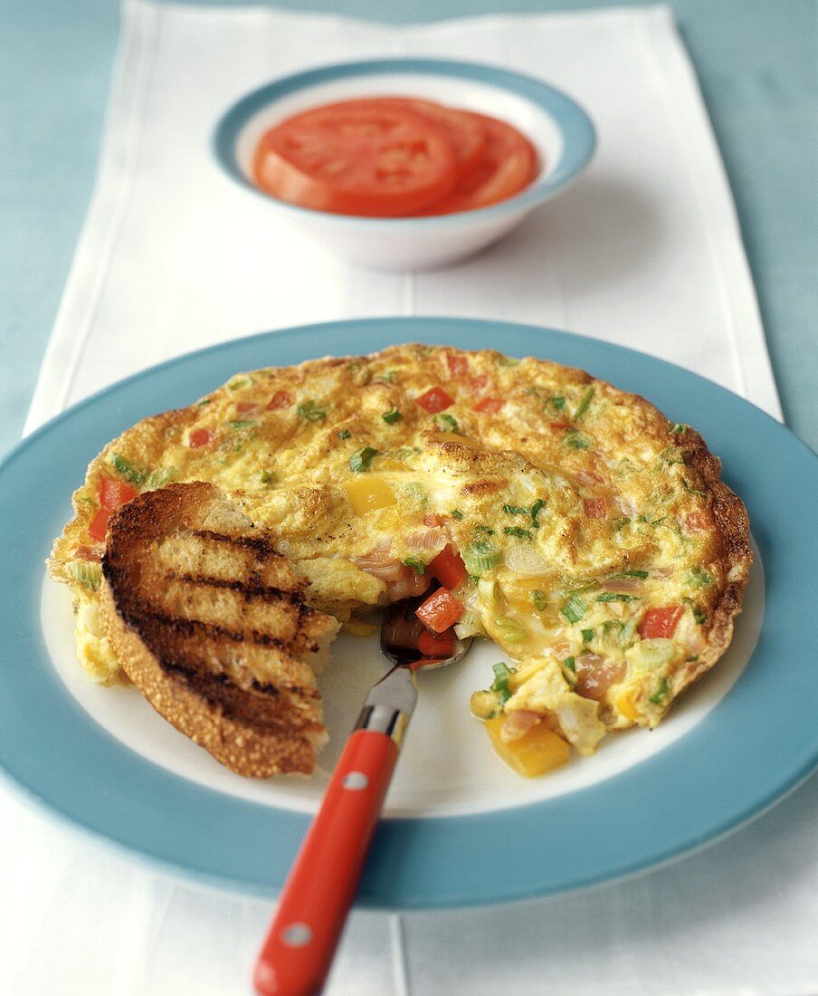 Vegetable frittata with toasted bread