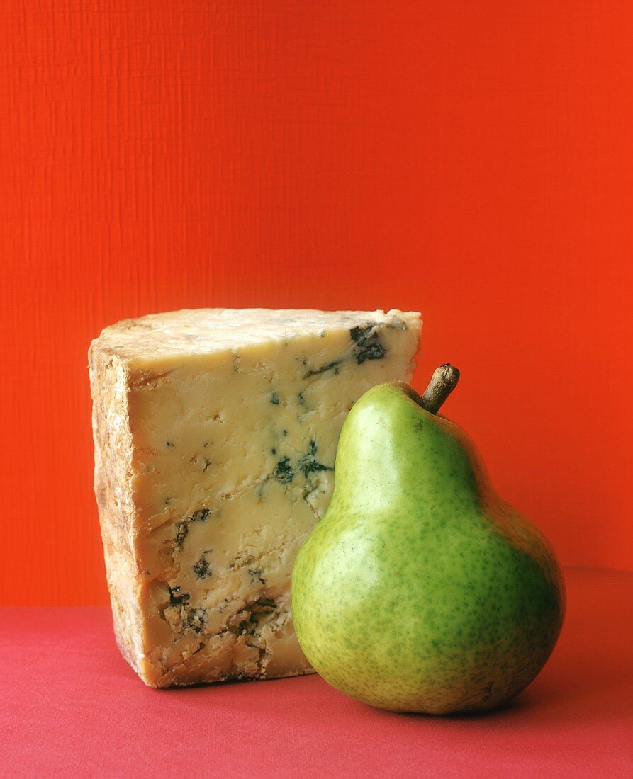 Piece of blue cheese and green pear