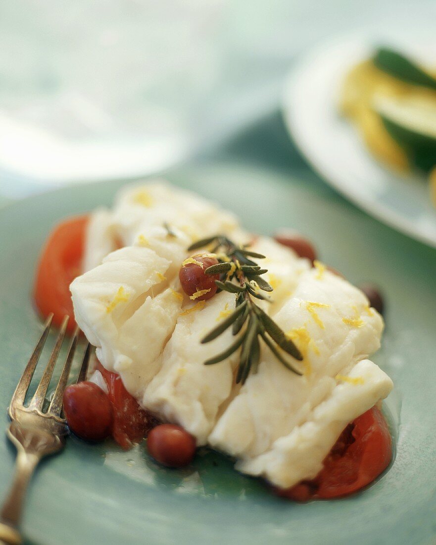 Fish fillet with tomatoes and rosemary