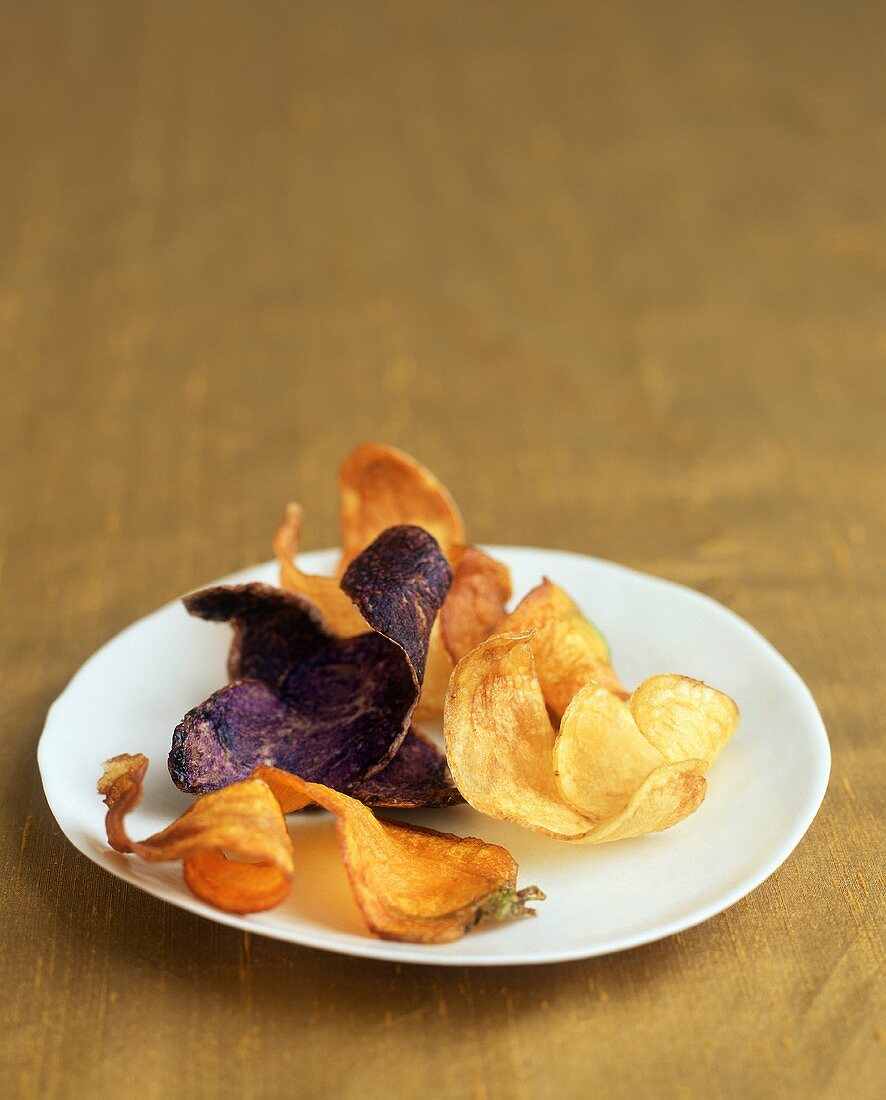 Assorted Potato Chips (White, Blue and Sweet) on a Plate