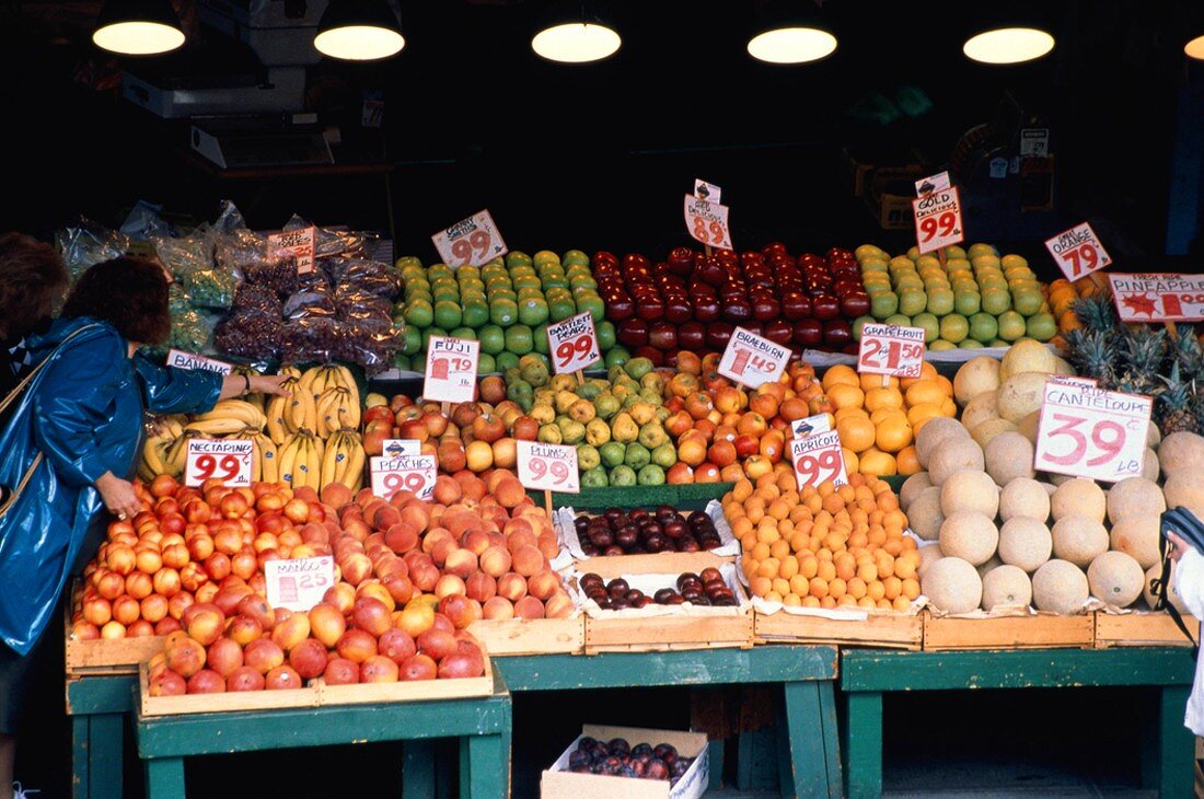 People Shopping at Fruit Stall