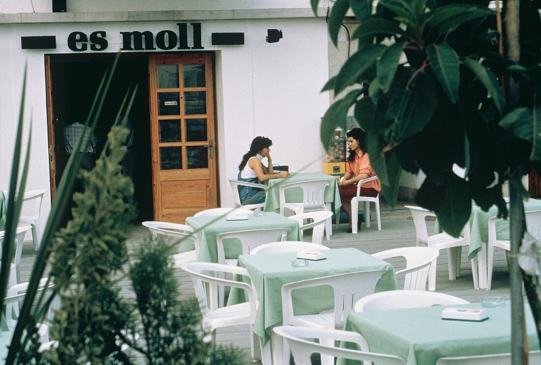 Two Women at Table at an Outdoor Cafe
