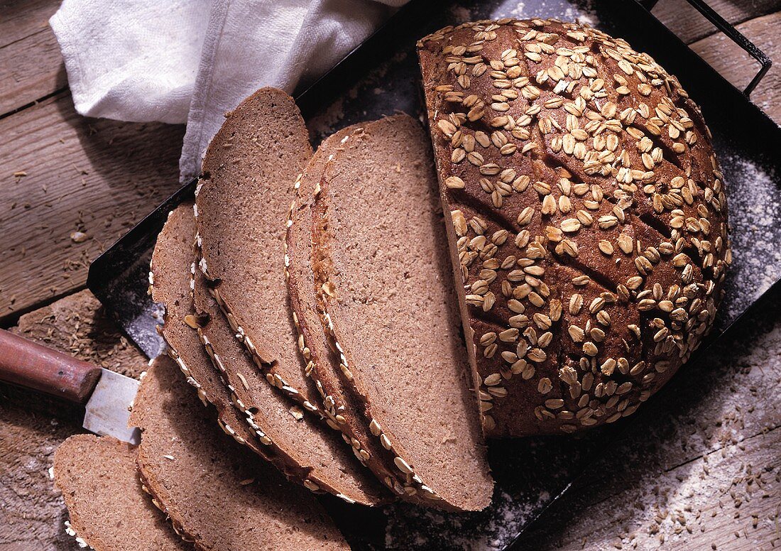 Rye Bread Loaf; Partially Sliced