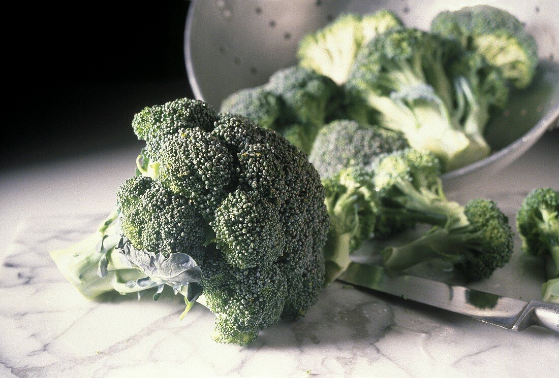 Broccoli Spilling Out of a Strainer