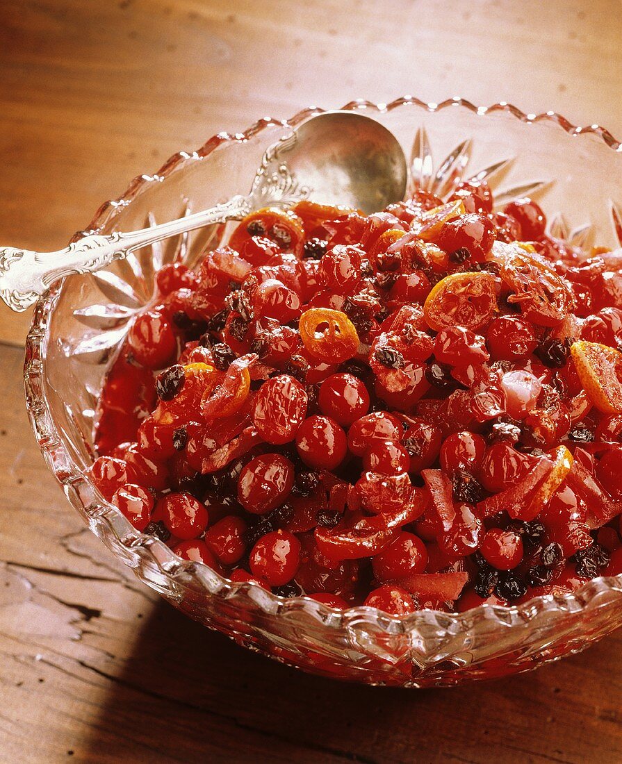 Cranberry and Kumquat Relish in a Bowl with a Spoon