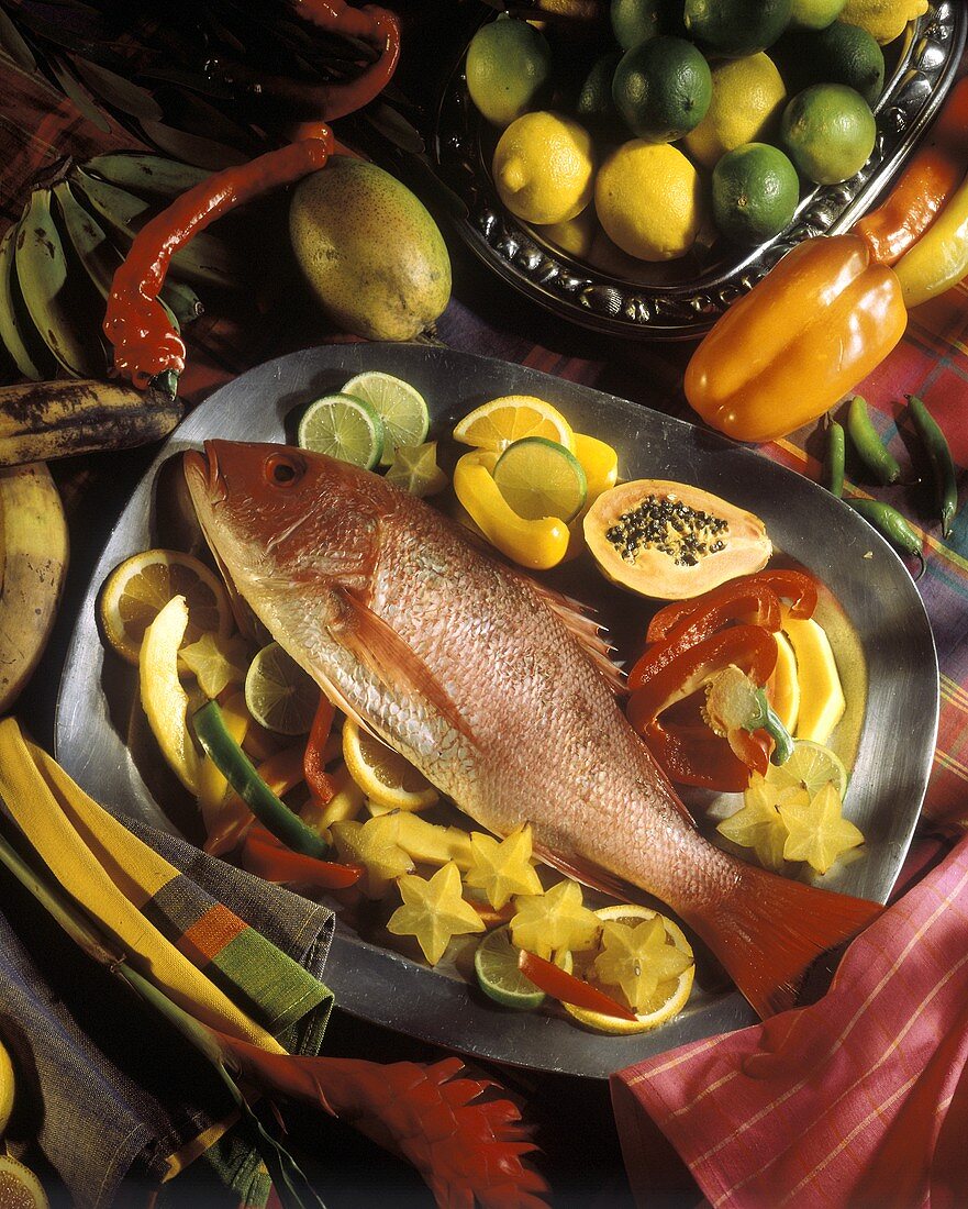 Red Snapper on a Platter with fruit and vegetables
