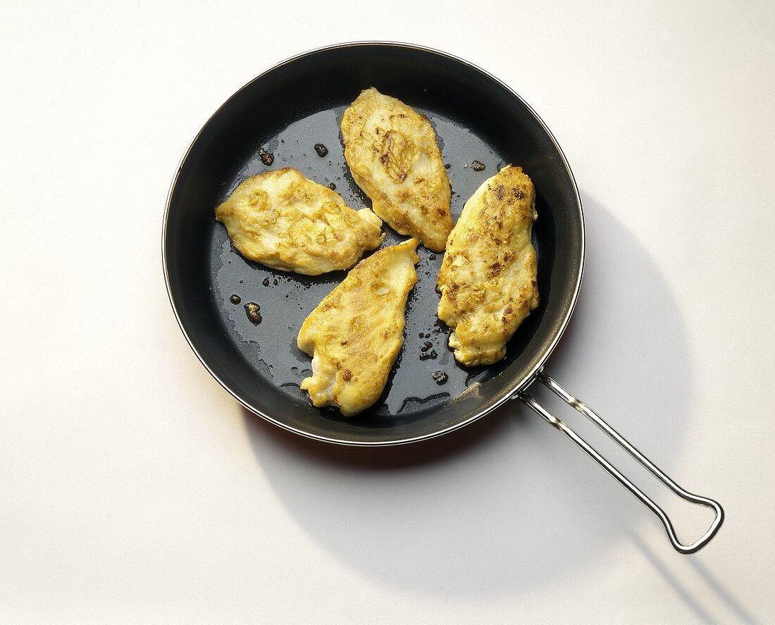 Sauteed Chicken Breasts in a Pan