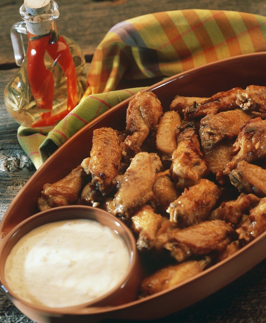 Buffalo Wings in a Serving Bowl; Dip