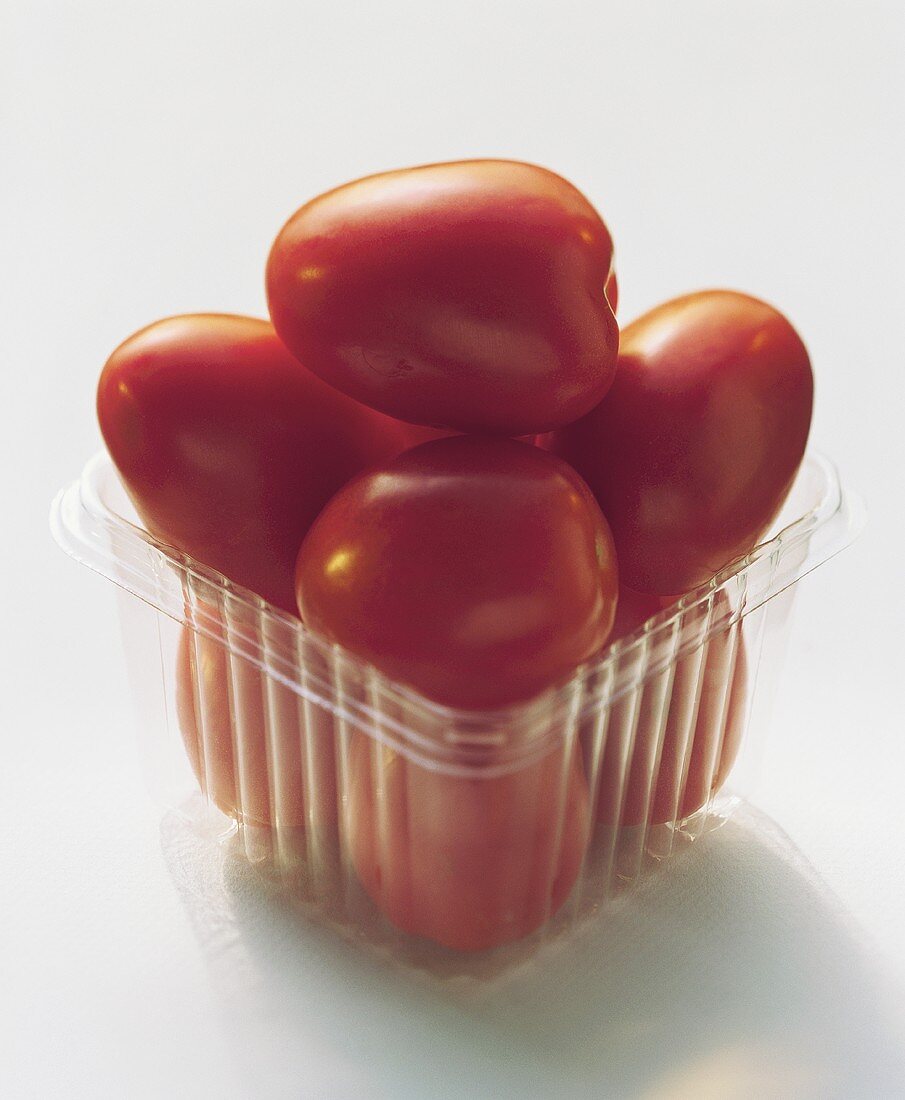 Plum Tomatoes in a Plastic Container