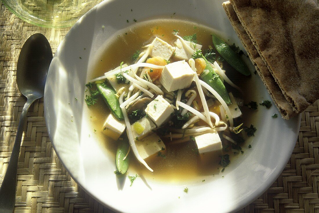 A Bowl of Tofu Soup; Pita Bread