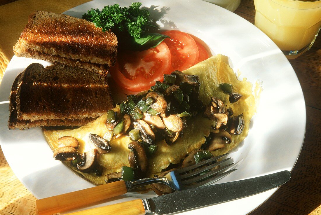 Mushroom and Pepper Omelet with Tomatoes and Toast