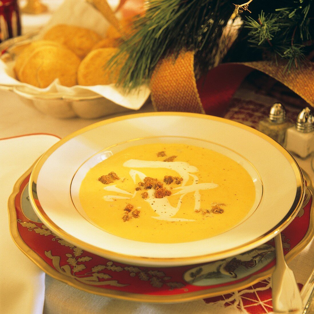 A Serving of Squash Soup on a Christmas Table