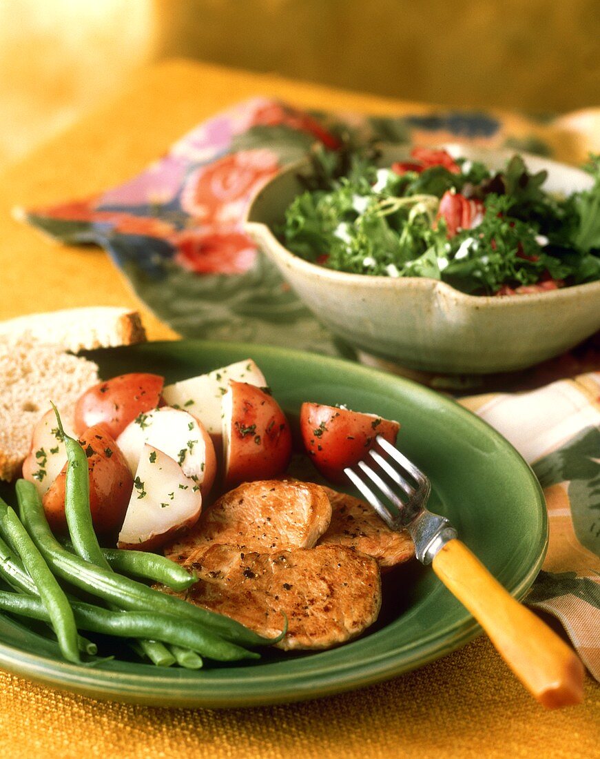 Pan Fried Pork with Red Potatoes and Green Beans; Salad