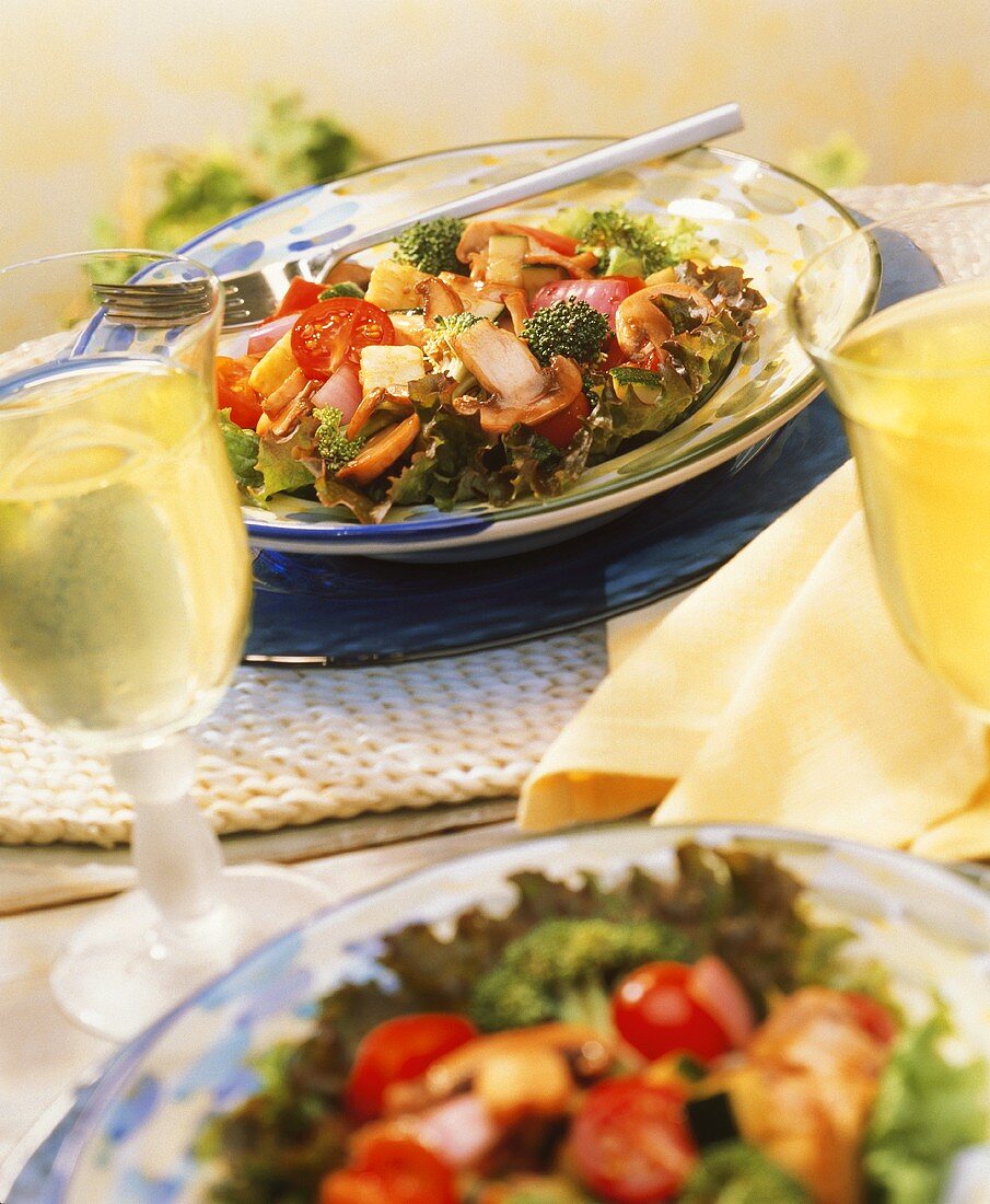 Sauteed Vegetable Salad with a Glass of White Wine