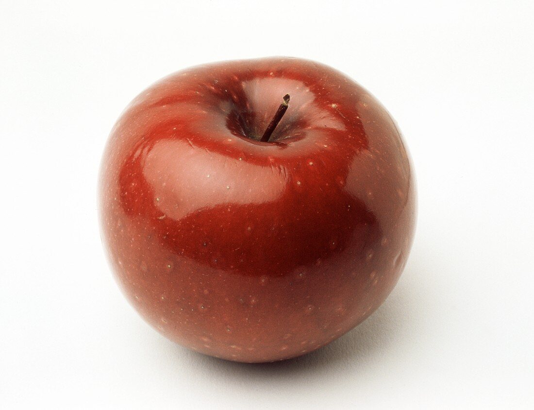 Ein roter, glänzender Apfel
