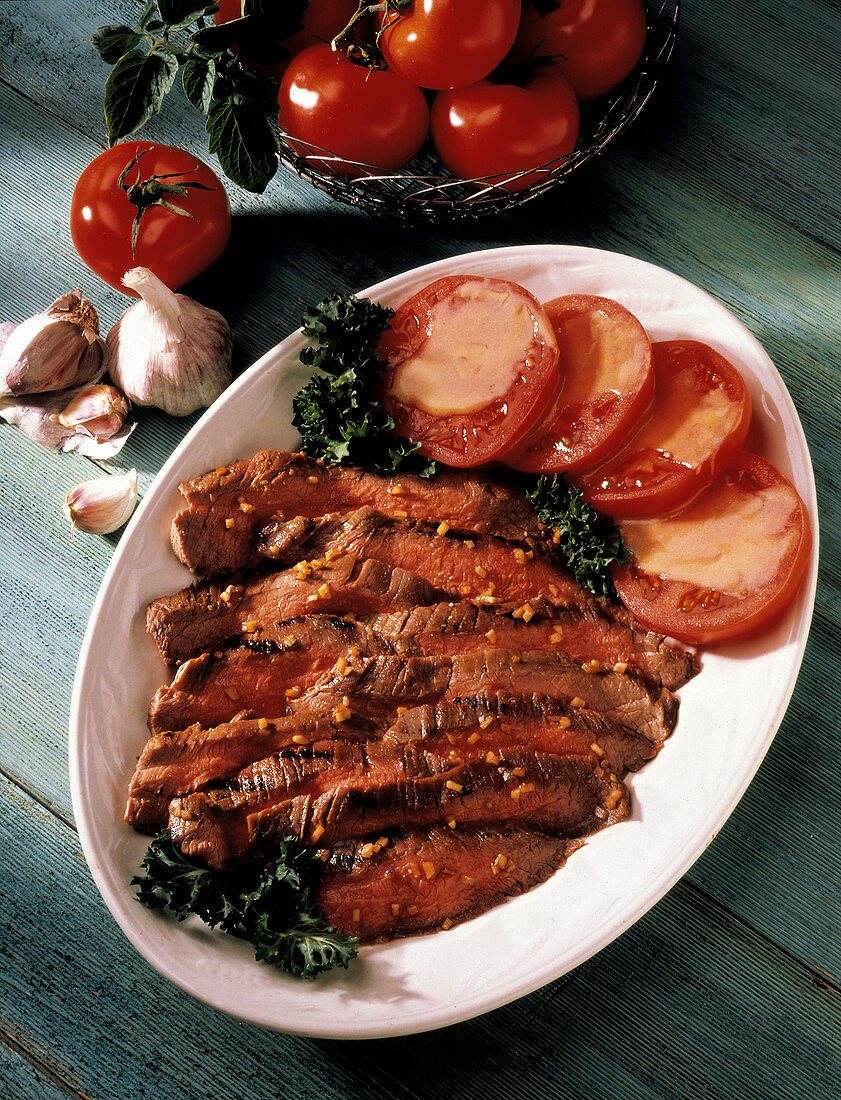 Sliced Flank Steak; Tomatoes in a Honey Mustard Vinaigrette