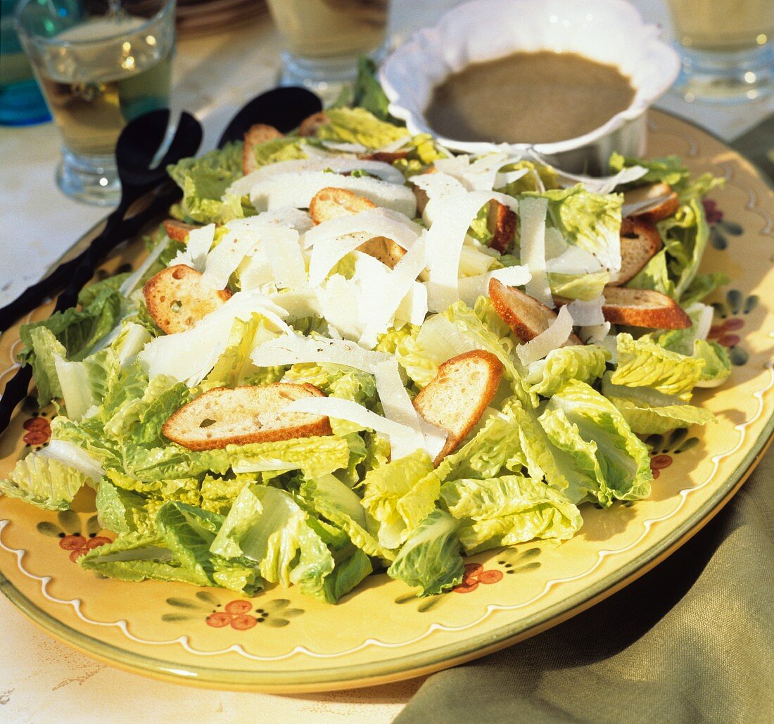 Caesar Salad on a Yellow Platter