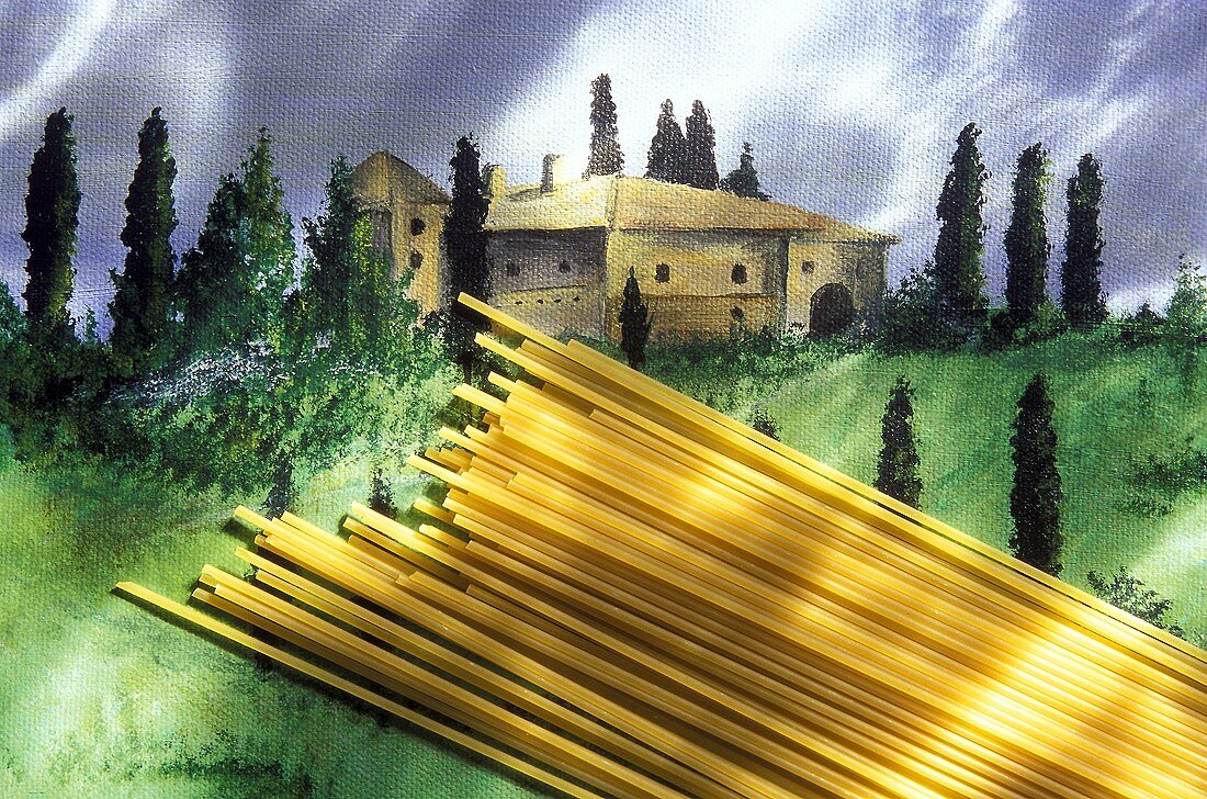 Dried Linguine on a Painting of Tuscany